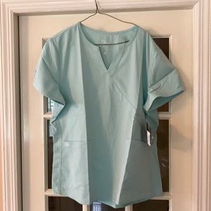 Women mint color Nrg Uniform Top In 2 styles